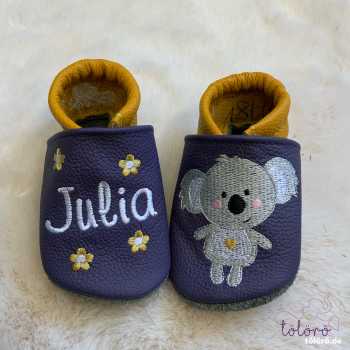 Name mit Blumen und Koala